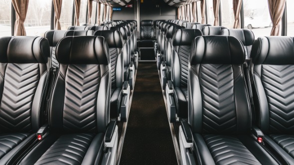 56 passenger charter bus inside garland